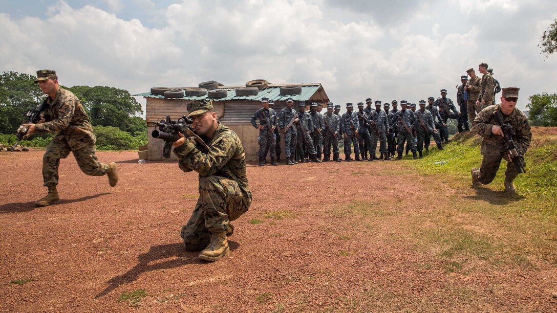 U.S. Marines demonstrate bounding toward an objective as a squad during a military tactics training and exchange, part of a theater security cooperation engagement at Welissara Naval Base, Sri Lanka, March 29, 2017. Marine Corps photo by Cpl. Devan K. Gowans