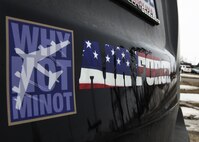 Bumper stickers are displayed on the back of a personally owned vehicle at Minot Air Force Base, N.D., March 16, 2017. Airmen may have bumper stickers on their POVs as long as they don’t discredit the Air Force. (U.S. Air Force photo/Airman 1st Class Alyssa M. Akers)