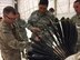 Chief Master Sgt. Erik Thompson (left), the base command chief, works with Airman 1st Class Kyle Stephens, hydraulics journeyman with the evaluation team, to thread netting to repair a “rib” on a Variable Speed Drogue assembly, March 7, 2017. Cannon Air Force Base has been the leading edge in testing the VSD, which provides a gap-filler capability to refuel aircraft between low and high speeds; enabling more flexibility for mission support. (U.S. Air photo by Tech. Sgt. Manuel J. Martinez)