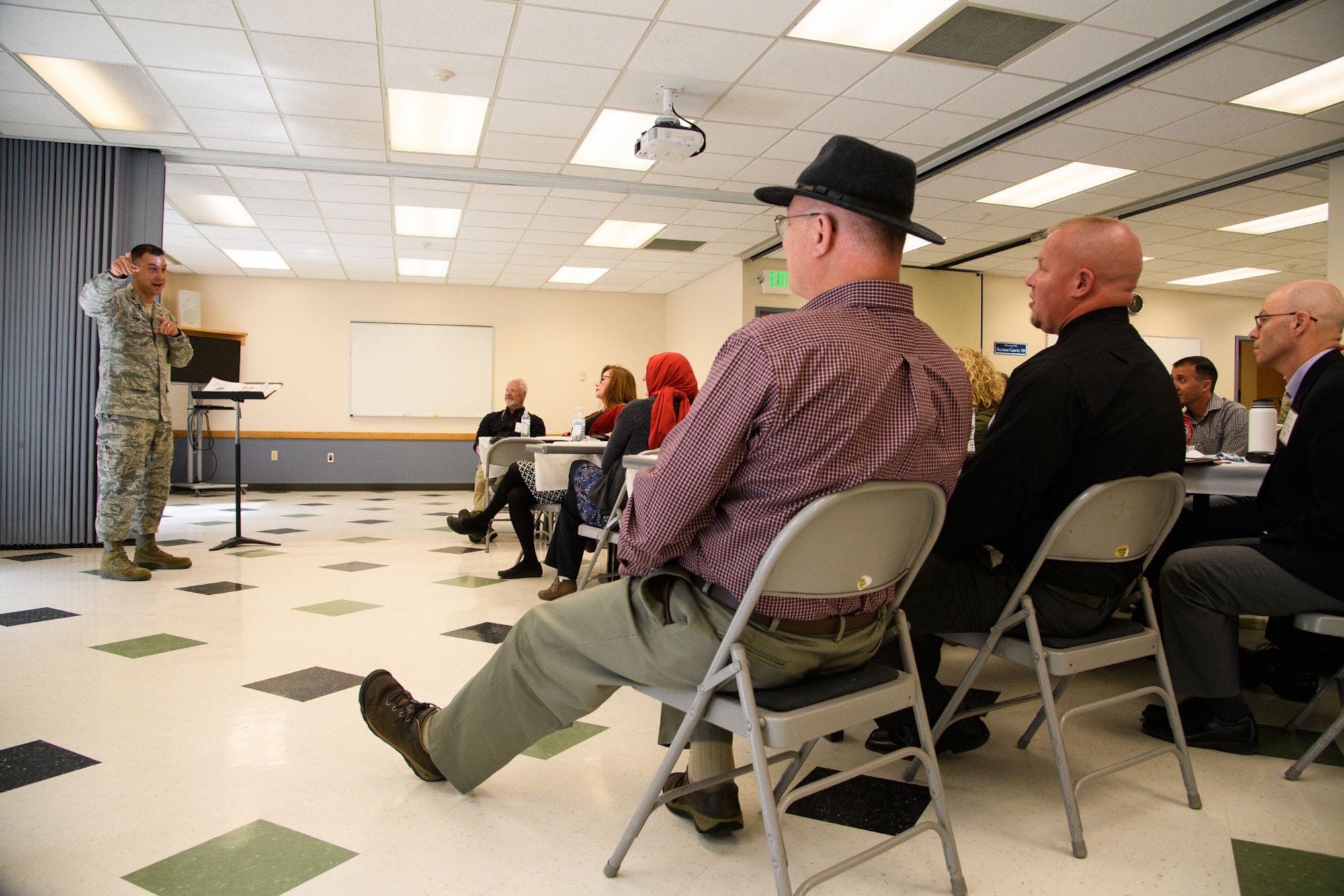 Chaplain (Maj.) Lukus Counterman, 75th Air Base Wing, speaks with local clergy during a Faith Leaders Summit at Hill Air Force Base, Utah, April 6, 2017. The event fostered resource networking and familiarized attendees with the mission, demands and operational tempo experienced by military and civilian Airmen working and living on base. (U.S. Air Force photo/R. Nial Bradshaw)