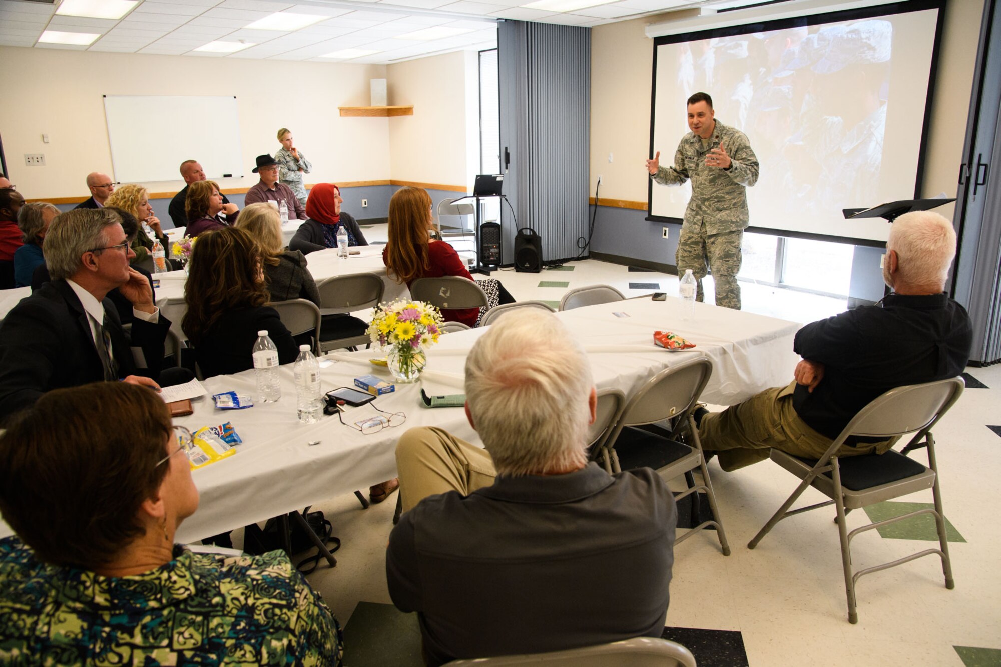 Chaplain (Maj.) Lukus Counterman, 75th Air Base Wing, speaks with local clergy during a Faith Leaders Summit at Hill Air Force Base, Utah, April 6, 2017. The event fostered resource networking and familiarized attendees with the mission, demands and operational tempo experienced by military and civilian Airmen working and living on base. (U.S. Air Force photo/R. Nial Bradshaw)