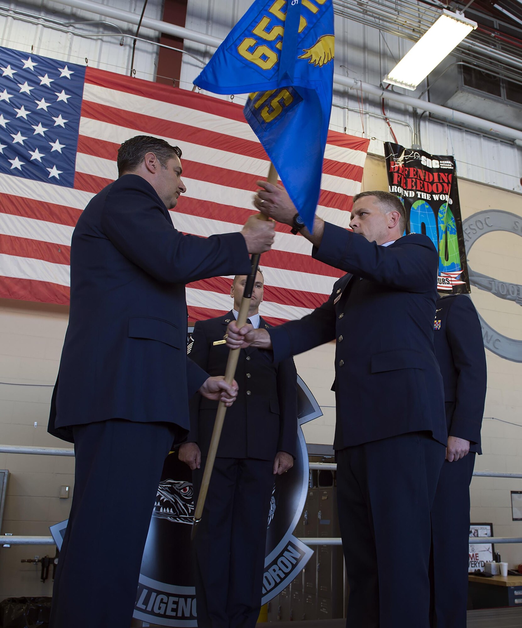 Lt. Col. Kenneth D. Alderman, incoming 28th Intelligence Squadron commander, takes command from Lt. Col. Joseph T. Marcinek during a change of command ceremony here March 31, 2017. Alderman is coming from the 2nd Special Operations Squadron. (U.S. Air Force photo/1 SOW Public Affairs)