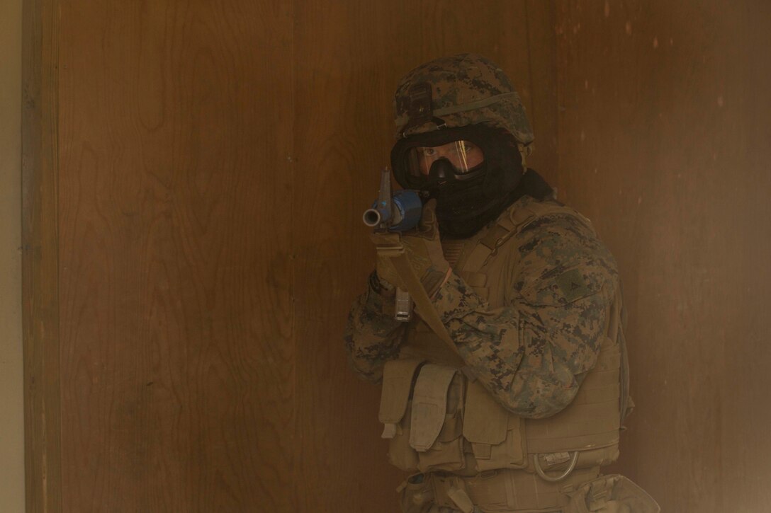 A Marine provides security for his fire team during a Basic Urban Skills Training course at a Military Operations on Urbanized Terrain event at Camp Lejeune, N.C., April 5, 2017. The Marines participated in the training to learn and reinforce infantry skills as a predeployment work up. The Marines are with 2nd Light Armored Reconnaissance Battalion, Bravo Company, 2nd Marine Division. (U.S. Marine Corps photo by Pfc. Abrey D. Liggins)
