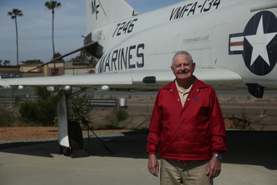 Retired Lt. Col. Jay Bibbler stands in front of a McDonald Douglas F-4S Phantom at The Flying Leatherneck Aviation Museum just outside Marine Corps Air Station Miramar, Calif., April 6. Bibbler flew other versions of the F-4 while supporting combat missions during the Vietnam War. (U.S. Marine Corps photo by Sgt. David Bickel/Released)