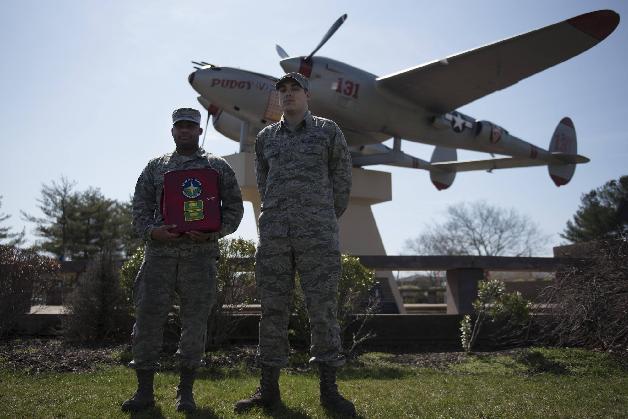 Airman 1st Class Isaiah Lee Davis and Airman 1st Class Nick Whaling, both crew chiefs with the 305th Maintenance Squadron, maintain the P-38 Lightning on the McGuire-side of Joint Base McGuire-Dix-Lakehurst, New Jersey, April 3, 2017. The Guardians of History program was created to ensure the upkeep of the Air Force's static displays.