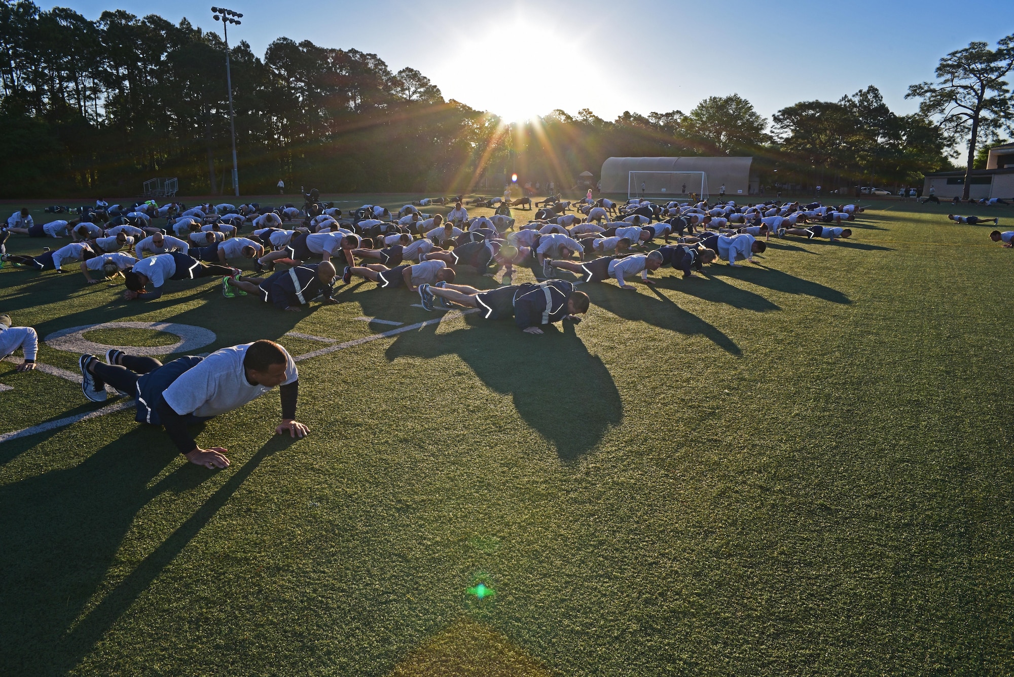 Air Commandos assigned to Headquarters Air Force Special Operations Command warm up before a Command Run at Hurlburt Field, Fla., April 7, 2017. Lt. Gen. Brad Webb, AFSOC commander, and Chief Master Sgt. Greg Smith, AFSOC command chief, led the command in the 5K run. (U.S. Air Force photo/Staff Sgt. Melanie Holochwost)