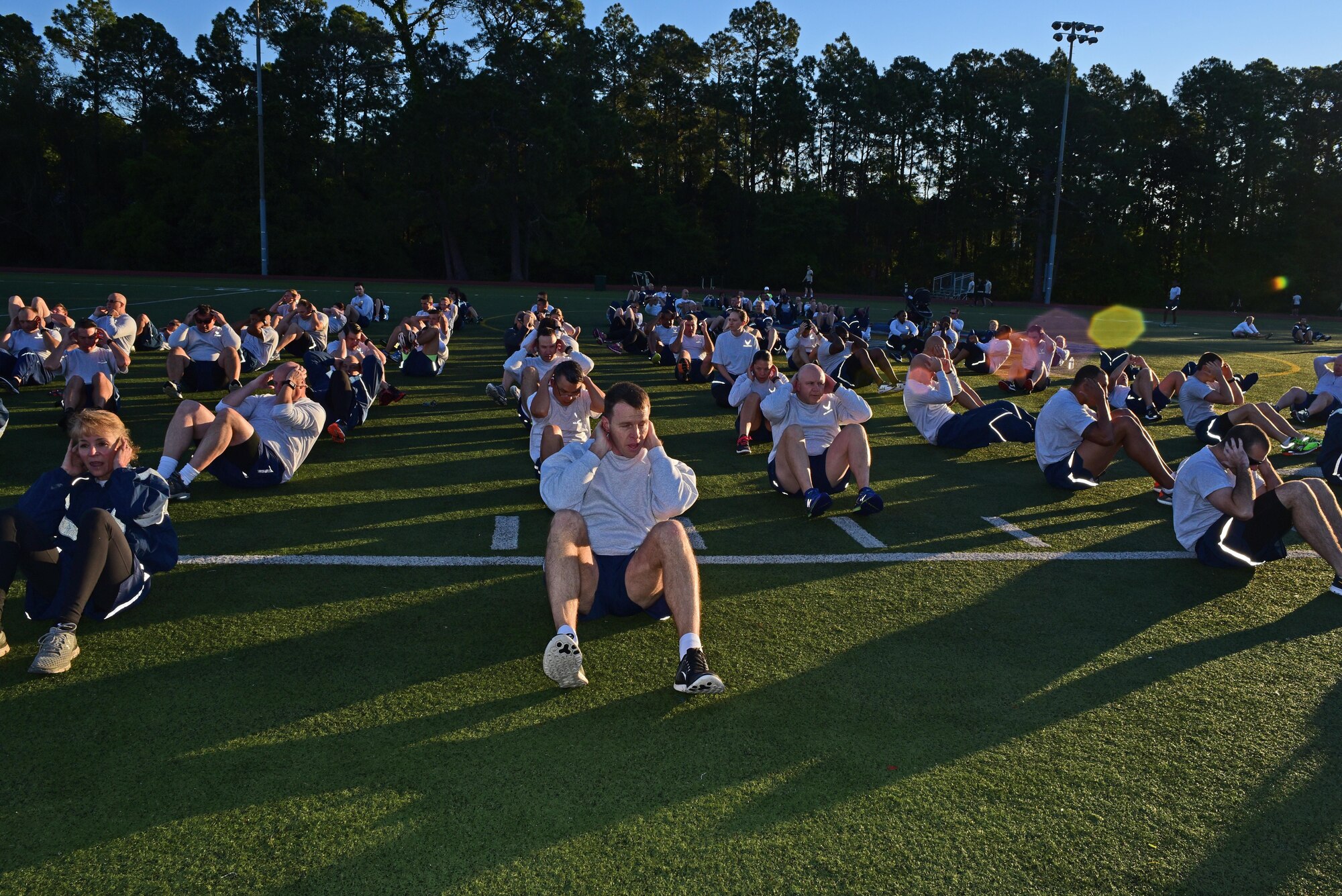 Air Commandos assigned to Headquarters Air Force Special Operations Command warm up before a 5K run at Hurlburt Field, Fla., April 7, 2017. The run occurs on the first Friday of every month. (U.S. Air Force photo/Staff Sgt. Melanie Holochwost)