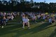 Air Commandos assigned to Headquarters Air Force Special Operations Command warm up before a 5K run at Hurlburt Field, Fla., April 7, 2017. The run occurs on the first Friday of every month. (U.S. Air Force photo/Staff Sgt. Melanie Holochwost)