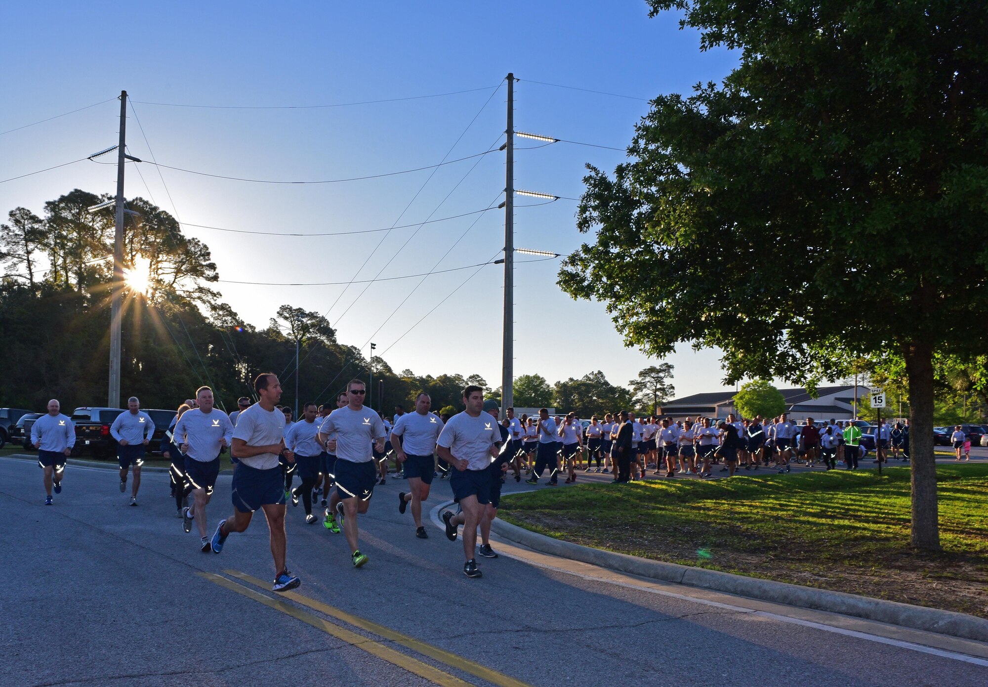 Air Commandos begin a 5K run at Hurlburt Field, Fla., April 7, 2017. Both Airmen and civilians assigned to Headquarters Air Force Special Operations Command ran together during a physical training session. (U.S. Air Force photo/Staff Sgt. Melanie Holochwost)