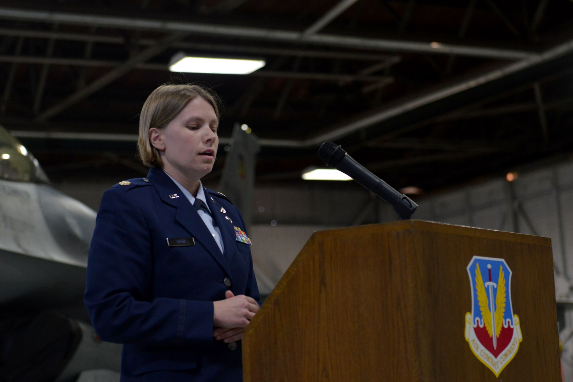 U.S. Air Force Maj. Kristen M. Torma, 20th Aircraft Maintenance Squadron (AMXS) commander, speaks during a memorial service for Staff Sgt. Austin Terrell, 20th AMXS armament technician, at Shaw Air Force Base, S.C., April 7, 2017. Friends and family gathered to share memories about Terrell, remembering him as a meritorious Airman, a treasured member of Team Shaw and a loving husband. (U.S. Air Force photo by Airman 1st Class Destinee Sweeney)