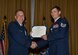 Lt. Gen. Brad Webb, the commander of Air Force Special Operations Command, presents Tech. Sgt. Brian Claughsey, a combat controller with the 21st Special Tactics Squadron, a Silver Star April 7, 2017, at Pope Army Airfield, N.C. Following a 96-hour battle with Taliban forces in Afghanistan, Claughsey was credited with coordinating 17 close air engagements, resulting in 47 enemy killed in action without a single civilian or friendly casualty. (U.S. Air Force photo/Senior Airman Ryan Conroy)