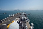 The amphibious assault ship USS Makin Island (LHD 8) arrives in Hong Kong for a scheduled port visit, April 7, 2017. Makin Island, the flagship for the Makin Island Amphibious Ready Group, with the embarked 11th Marine Expeditionary Unit, is operating in the Indo-Asia-Pacific region to enhance amphibious capability with regional partners and to serve as a ready-response force for any type of contingency. 