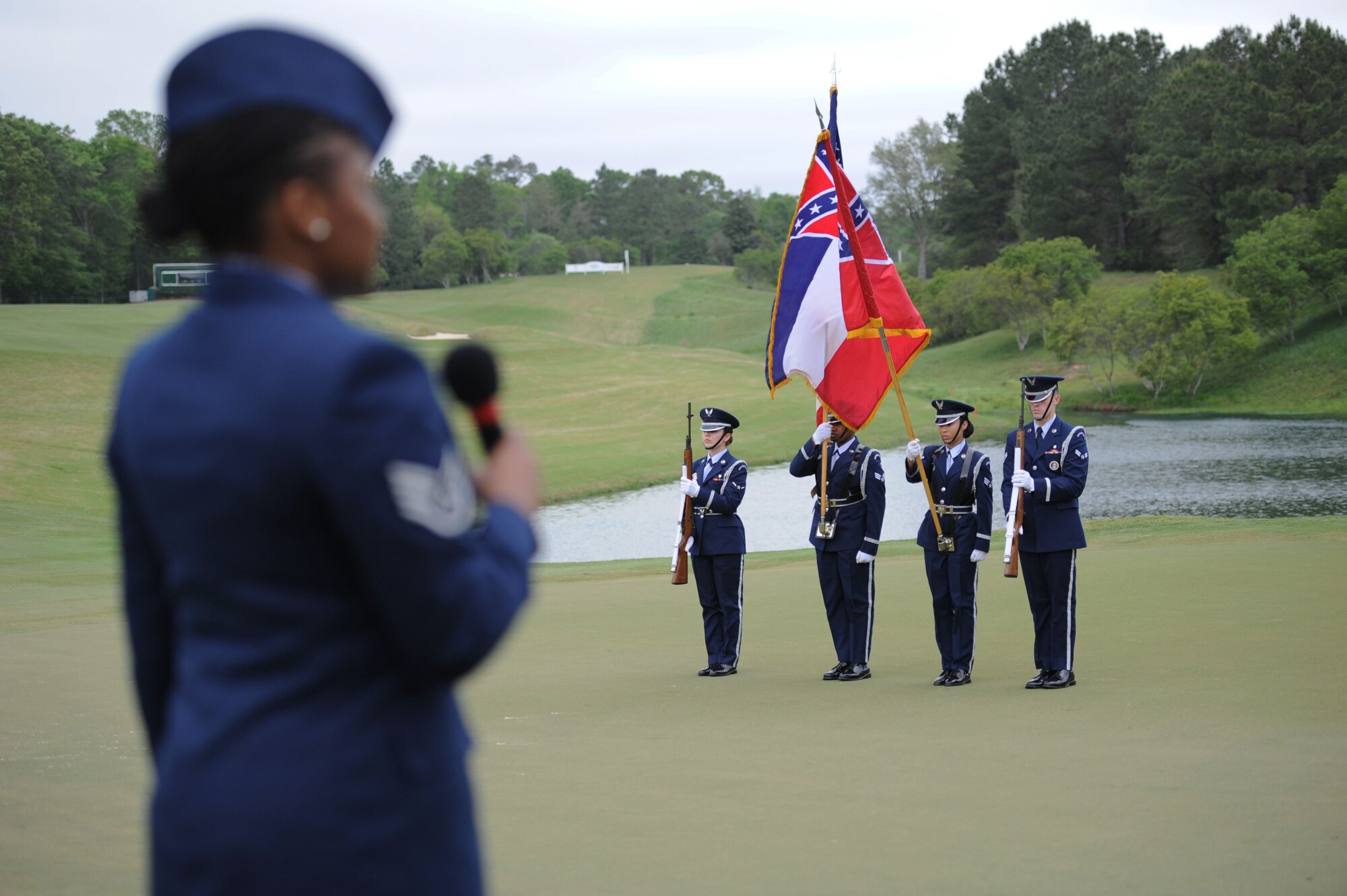 The Keesler Honor Guard presents the colors during the Mississippi Gulf Resort Classic closing ceremonies at the Fallen Oak Golf Course, April 2, 2017, in Saucier, Miss. Col. Michele Edmondson, 81st Training Wing commander, and Keesler personnel participated in the festivities. (U.S. Air Force photo by Kemberly Groue)