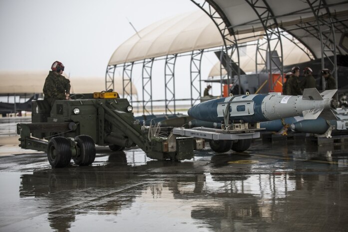 U.S. Marine Corps Marine Fighter Attack Squadron (VMFA) 121 conducts a hot reload on an F-35B Lightning II at Marine Corps Air Station Iwakuni, Japan, April 6, 2017. Marines loaded the F-35 while the pilot remained in the aircraft with the engine running. This training ensures the aircraft can reload as fast as possible if need be. 