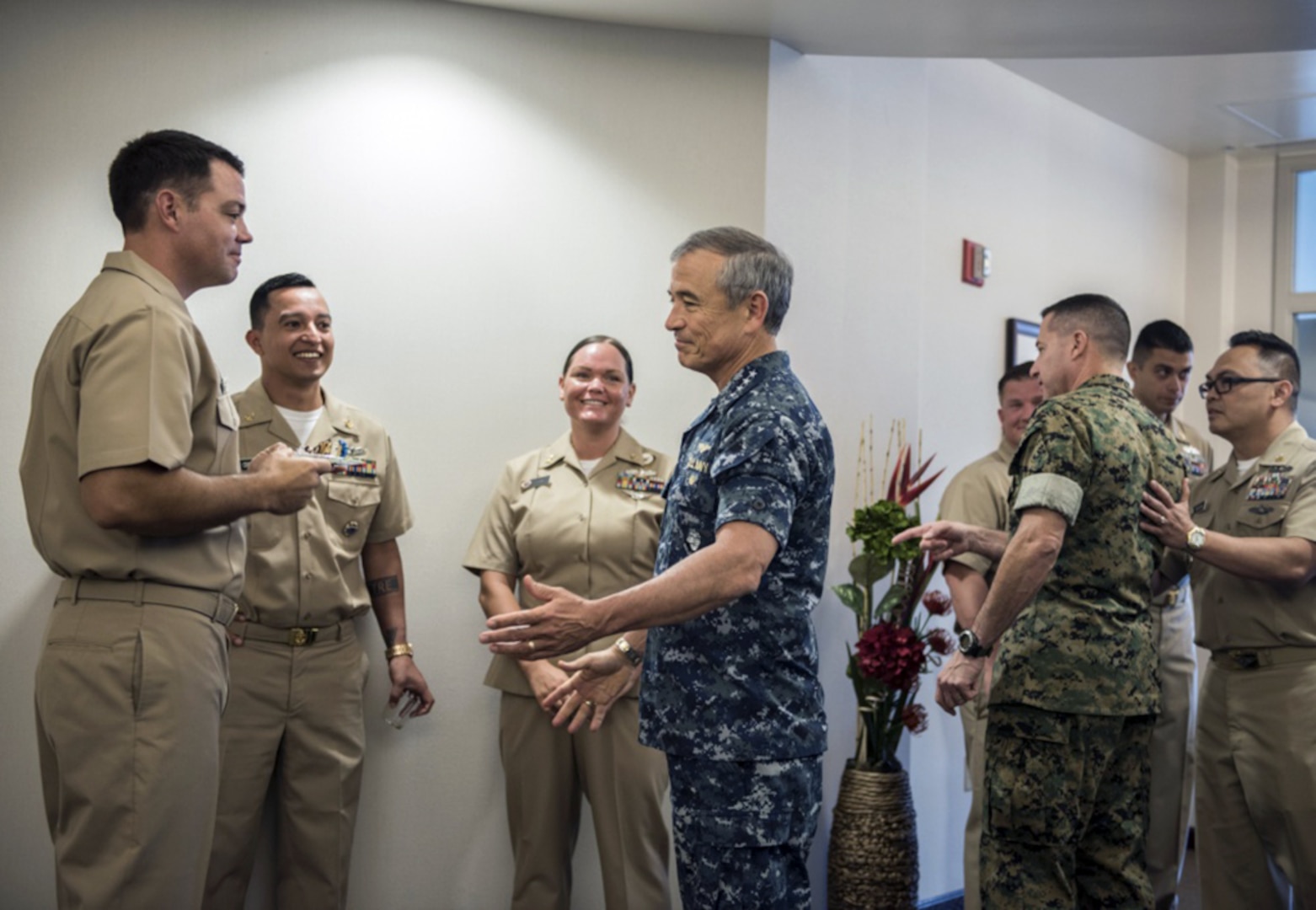 Adm. Harry B. Harris, commander of U.S. Pacific Command (PACOM), interacts with participants of the chief petty officer birthday ceremony at USPACOM headquarters. Harris, the son of a Chief and life-long advocate for the Navy leadership model, charged those in the PACOM region to share their skills with the other services, April 3, 2017. “My call to action for all Chiefs is to take on the challenge to lead all of our Joint forces and help synergize our operations across all the Services,” said Harris. “Helping our Services train how we need to fight in the 21st century – jointly. Mentoring the future Joint leaders that will be ready to fight tonight and win.”