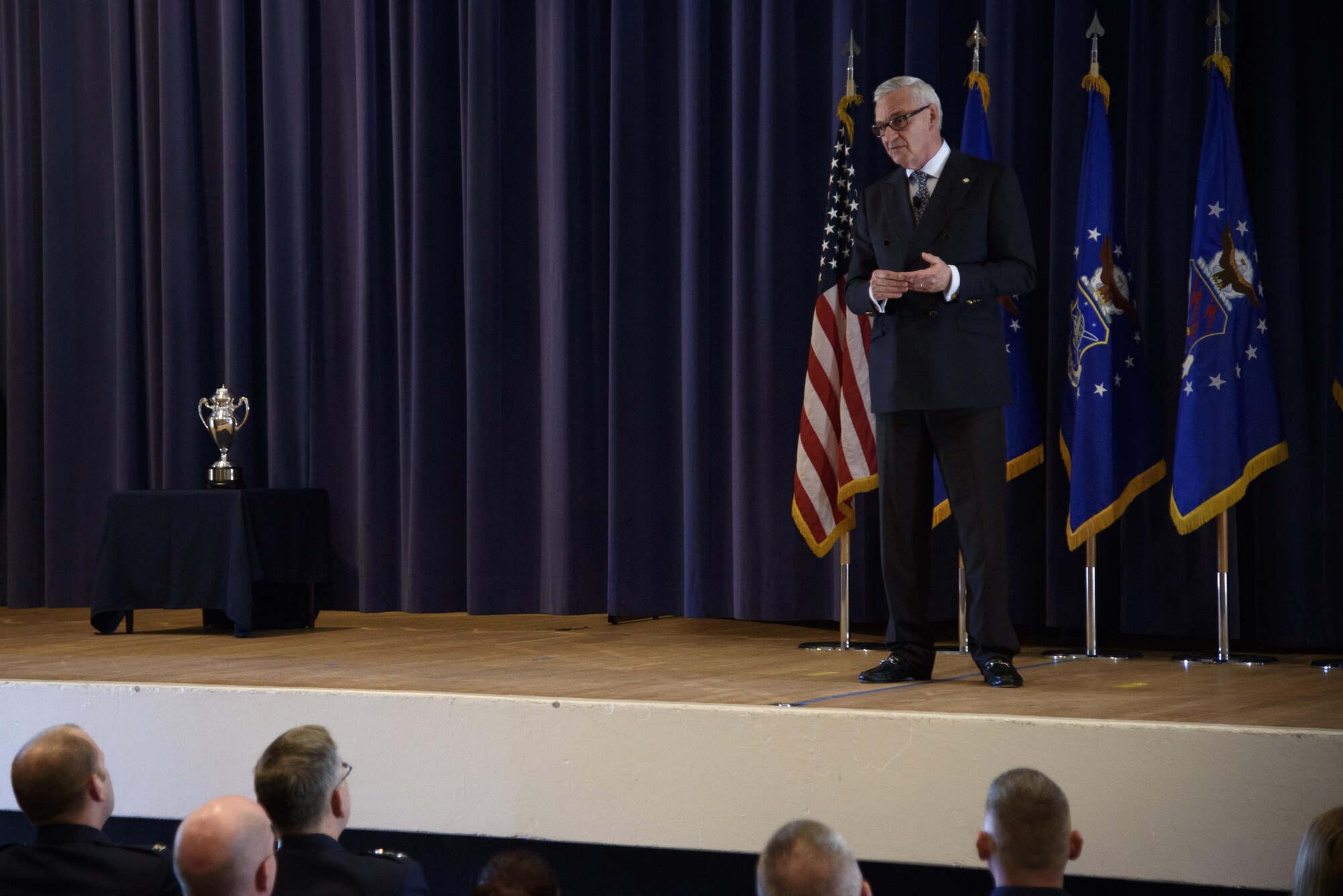 PETERSON AIR FORCE BASE, Colo. – Mogens Bay, Strategic Command Consultation Committee, addresses and congratulates the 21st Space Wing for winning the Omaha Trophy at a ceremony in the auditorium on Peterson Air Force Base, Colo., April 6, 2017. An advisory group of business leaders in Omaha, Neb., created The Omaha Trophy on the 25th anniversary of the Air Force’s Strategic Air Command in 1971 to recognize the best wing in the command. (U.S. Air Force photo by Airman 1st Class Dennis Hoffman)