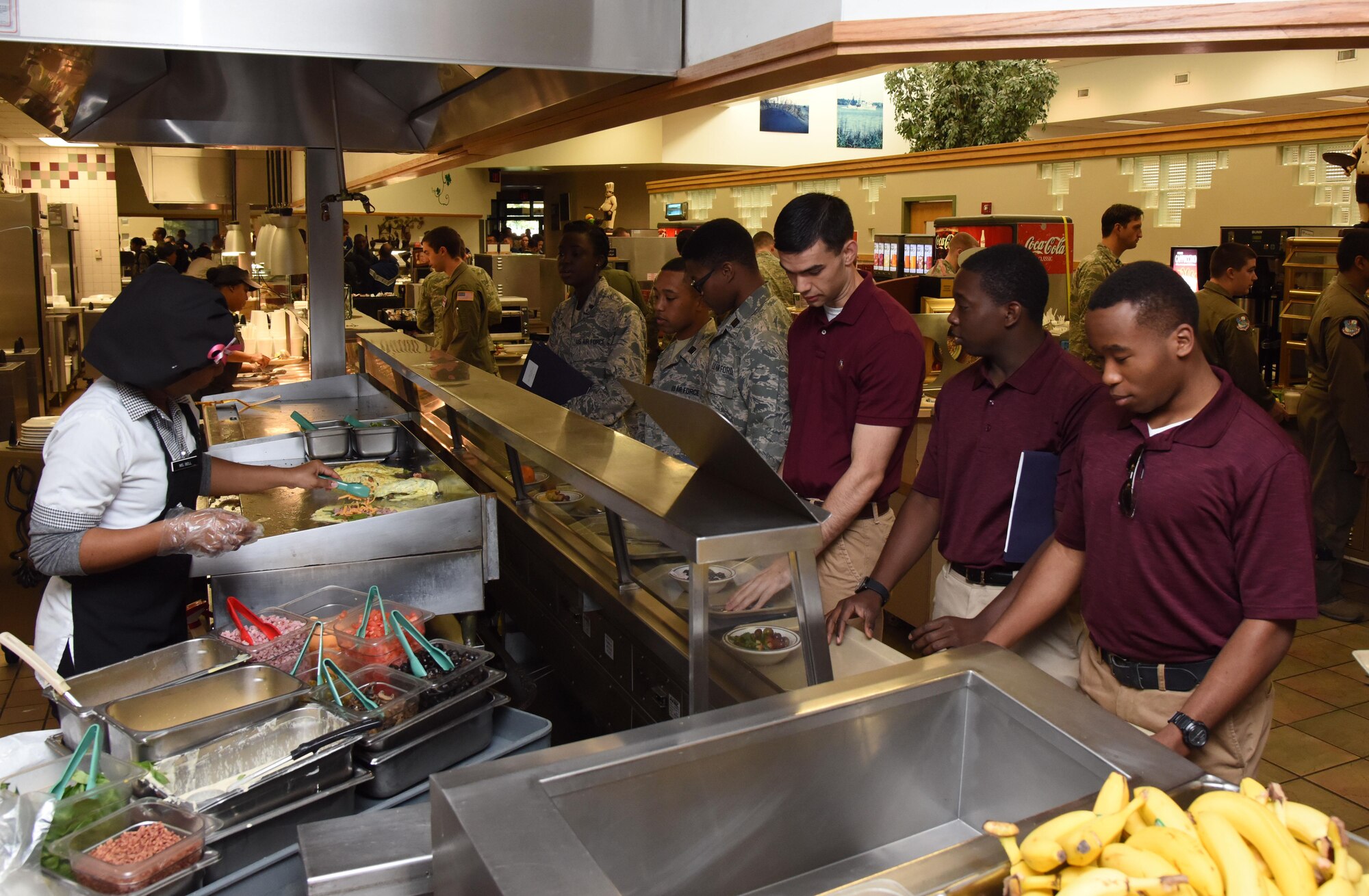 Air Force ROTC cadets walk through the breakfast line at the Azalea Dining Facility during Pathways to Blue April 7, 2017, on Keesler Air Force Base, Miss. Pathways to Blue, a diversity outreach event hosted by 2nd Air Force, gives cadets briefings on technical and flying operations and an orientation flight in support of the Air Force's Diversity Strategic Roadmap program. (U.S. Air Force photo by Kemberly Groue)