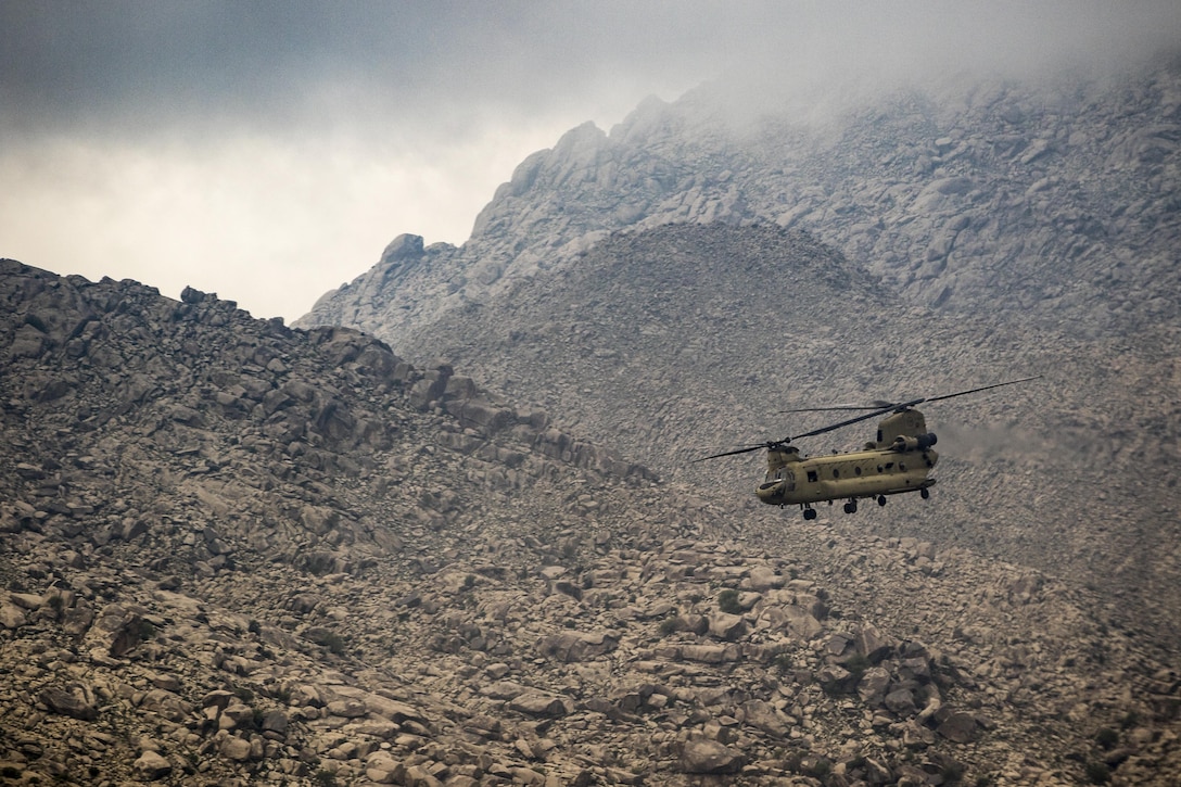 Army CH-47 Chinook helicopter pilots fly near Jalalabad, Afghanistan, April 5, 2017. The pilots are assigned to the 7th Infantry Division's Task Force, 16th Combat Aviation Brigade.The unit is preparing to support Operation Freedom’s Sentinel and Resolute Support. Army photo by Capt. Brian Harris 