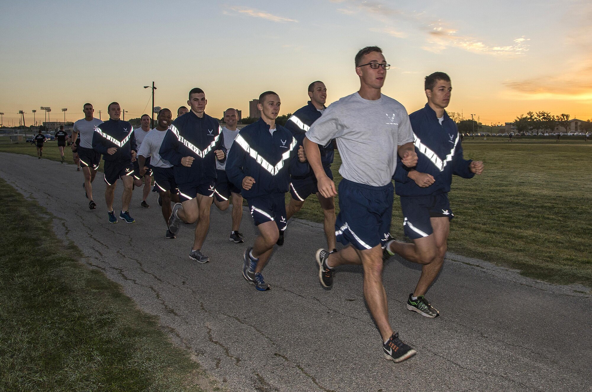 Members of the 350th Battlefield Airmen Training Squadron and Airmen from throughout Joint Base San Antonio-Lackland complete a run during a memorial remembrance ceremony honoring Lt. Col. William “Bill” Schroeder April 7, 2017, at JBSA-Lackland, Texas, Medina Annex. Schroeder’s unit honored his legacy by renaming a drop zone as Schroeder DZ and participated in a "Monster Mash" fitness competition, remembrance ceremony and log march. On April 8th, 2016 Schroeder recognized a perilous situation developing and reacted swiftly by putting himself between an armed individual and his first sergeant. In the process, he saved lives of other squadron members while being fatally wounded. Schroeder was posthumously awarded the Airman’s Medal, given to those that distinguish themselves by a heroic act – usually at the volunteer risk of their lives but not involving combat.  (U.S. Air Force photo by Johnny Saldivar)