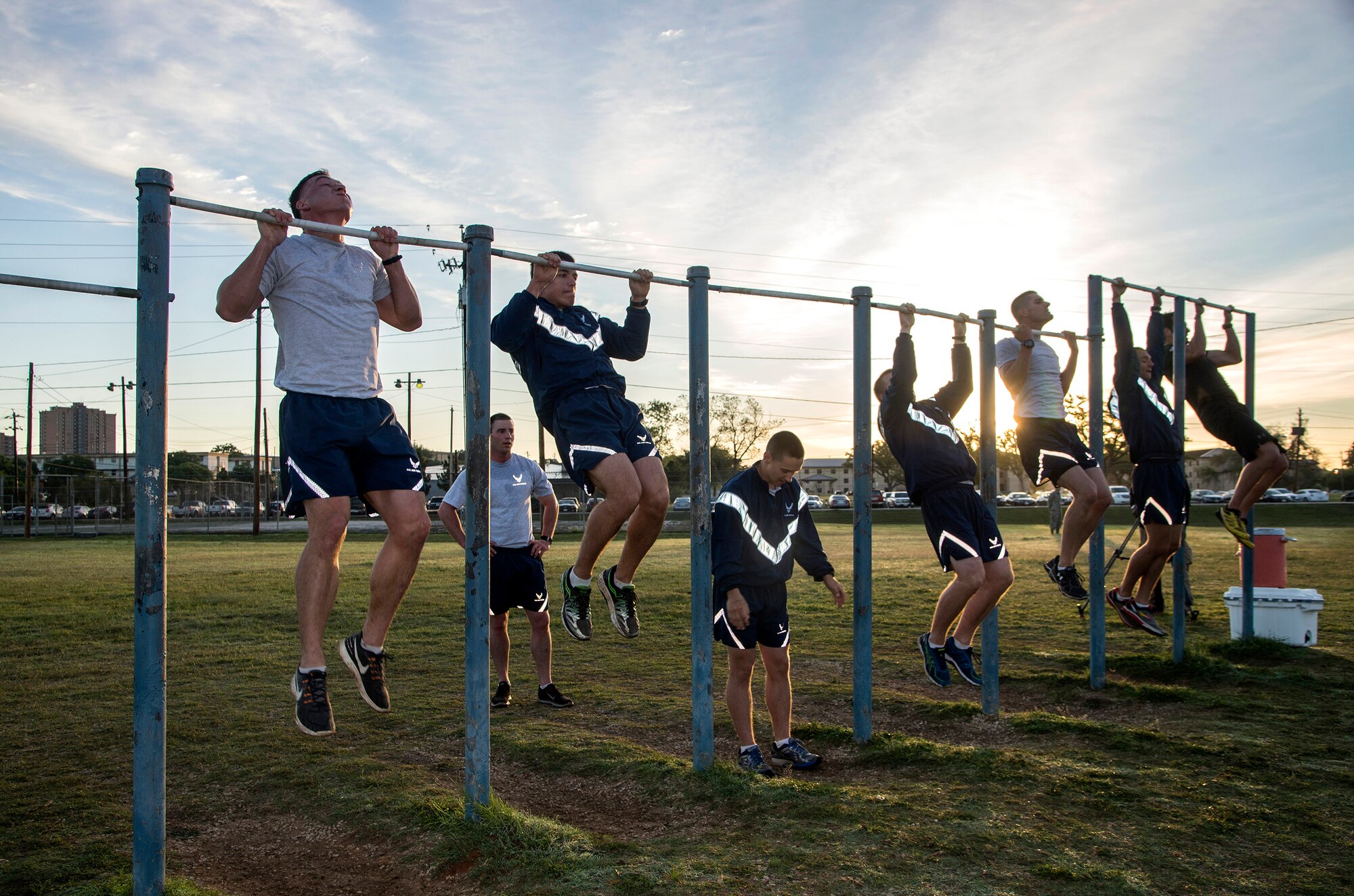 Members of the 350th Battlefield Airmen Training Squadron and from throughout Joint Base San Antonio-Lackland accomplish pull ups during a memorial remembrance ceremony honoring Lt. Col. William “Bill” Schroeder April 7, 2017, at JBSA-Lackland, Texas, Medina Annex. Schroeder’s unit honored his legacy by renaming a drop zone as Schroeder DZ and participated in a "Monster Mash" fitness competition, remembrance ceremony and log march. On April 8th, 2016 Schroeder recognized a perilous situation developing and reacted swiftly by putting himself between an armed individual and his first sergeant. In the process, he saved lives of other squadron members while being fatally wounded. Schroeder was posthumously awarded the Airman’s Medal, given to those that distinguish themselves by a heroic act – usually at the volunteer risk of their lives but not involving combat.  (U.S. Air Force photo by Johnny Saldivar)
