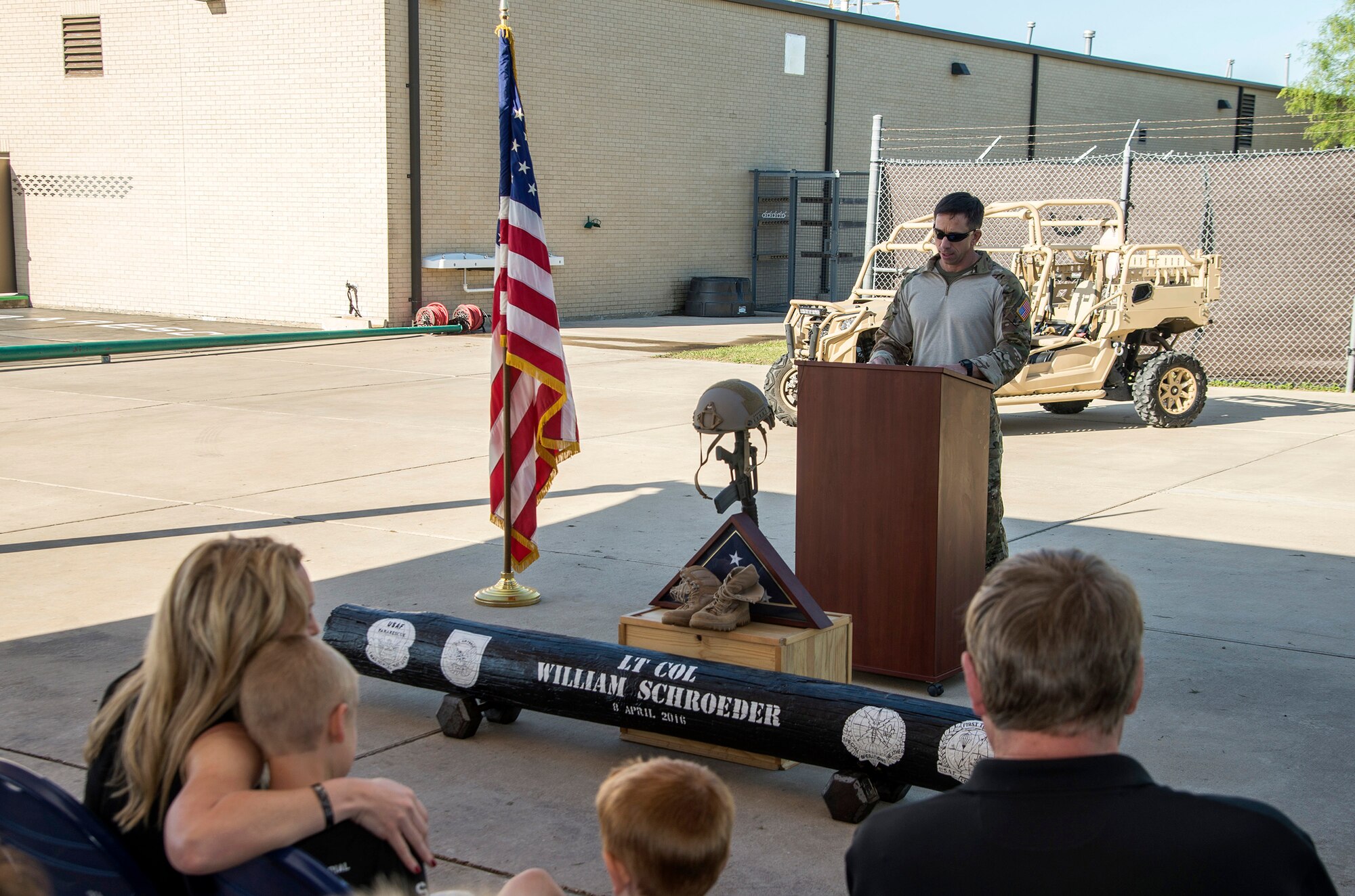Col. Ronald Stenger, Battlefield Airmen Training Group commander, addresses the crowd during a memorial remembrance ceremony honoring Lt. Col. William “Bill” Schroeder April 7, 2017, at JBSA-Lackland, Texas, Medina Annex. Schroeder’s unit honored his legacy by renaming a drop zone as Schroeder DZ and participated in a "Monster Mash" fitness competition, remembrance ceremony and log march.  On April 8th, 2016 Schroeder recognized a perilous situation developing and reacted swiftly by putting himself between an armed individual and his first sergeant. In the process, he saved lives of other squadron members while being fatally wounded. Schroeder was posthumously awarded the Airman’s Medal, given to those that distinguish themselves by a heroic act – usually at the volunteer risk of their lives but not involving combat. (U.S. Air Force photo by Johnny Saldivar)

