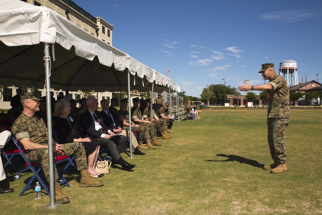 Brig. Gen. Paul K. Lebidine (right), the outgoing commanding general of 4th Marine Division, talks to Maj. Gen. Burke W. Whitman the incoming commanding general of 4th Marine Division, and his family during a change of command ceremony at Marine Corps Support Facility New Orleans, April 7, 2017. Whitman assumes leadership of the largest division command in the Marine Corps. (U.S. Marine Corps photo by Pfc. Niles Lee/Released)