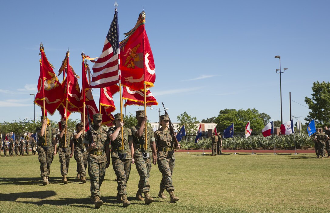 A New Orleans Color Guard walk the colors after a change of command ceremony at Marine Corps Support Facility New Orleans, April 7, 2017. The ceremony was held to relieve Brig. Gen. Paul K. Lebidine of command and to introduce Maj. Gen. Burke W. Whitman as the new commander. Whitman assumes leadership of the largest division command in the Marine Corps. (U.S. Marine Corps photo by Pfc. Niles Lee)