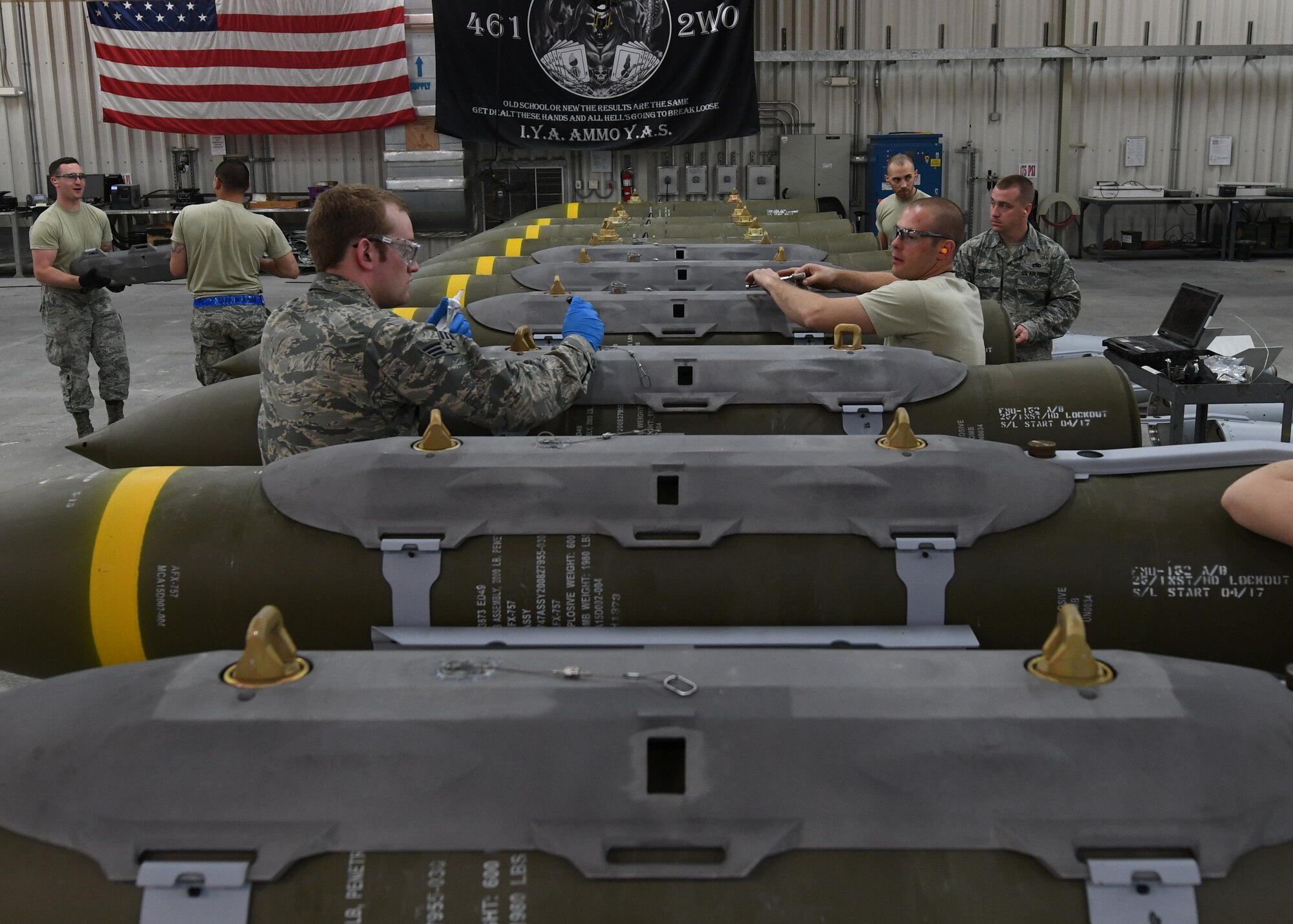 Ammo Airmen with the 379th Expeditionary Maintenance Squadron assemble guided bomb unit-31’s at Al Udeid Air Base, Qatar, April 6, 2017. The ammo Airmen at Al Udeid work around the clock to provide bombs and munitions used to support combat operations across the U.S. Central Command area of responsibility. (U.S. Air Force photo by Staff Sergeant Miles Wilson)