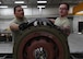 U.S. Air Force Airman 1st Class Austin Blom, left, and Staff Sgt. Woodrow Short, both ammo Airmen with the 379th Expeditionary Maintenance Squadron, attach a hardback installation to a guided bomb unit-31 at Al Udeid Air Base, Qatar, April 6, 2017. The ammo Airmen ensure that the bombs built at Al Udeid are safe and working properly through their diligent work and attentiveness to detail. (U.S. Air Force photo by Staff Sergeant Miles Wilson)