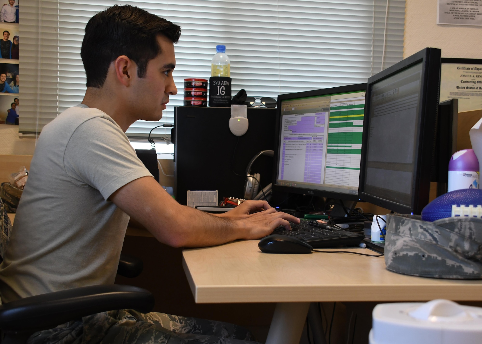 U.S. Air Force Senior Airman Fernando Cortez, a contracting officer with the 379th Expeditionary Contracting Squadron Commodities Flight, processes an order at Al Udeid Air Base, Qatar, April 5, 2017. The commodities flight improves mission capability and also brings the comforts of home to a deployed environment by procuring items and services such as flight equipment and wireless internet. (U.S. Air Force photo by Senior Airman Miles Wilson)