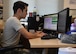 U.S. Air Force Senior Airman Fernando Cortez, a contracting officer with the 379th Expeditionary Contracting Squadron Commodities Flight, processes an order at Al Udeid Air Base, Qatar, April 5, 2017. The commodities flight improves mission capability and also brings the comforts of home to a deployed environment by procuring items and services such as flight equipment and wireless internet. (U.S. Air Force photo by Senior Airman Miles Wilson)