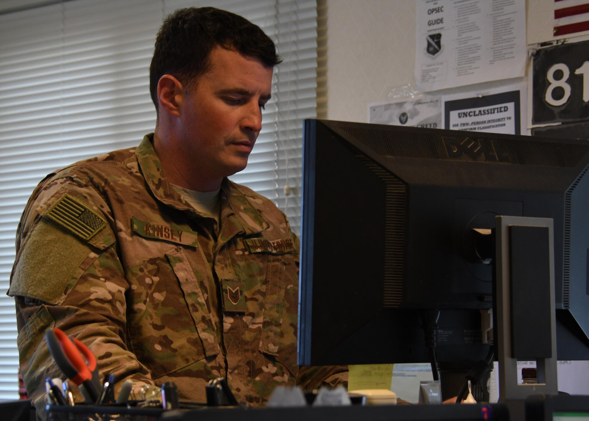 U.S. Air Force Tech. Sgt. Joshua Kinsey, the flight chief with the 379th Expeditionary Contracting Squadron Commodities Flight, processes an order at Al Udeid Air Base, Qatar, April 5, 2017. The commodities flight is responsible for purchasing any and all items that cannot be bought from the Desert Depot, supply, or by a unit’s GPC cardholders.  (U.S. Air Force photo by Senior Airman Miles Wilson)