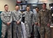 The 379th Expeditionary Contracting Squadron Commodities Flight poses for a group photo at Al Udeid Air Base, Qatar, April 5, 2017. The commodities flight improves mission capability and also brings the comforts of home to a deployed environment by procuring items and services such as flight equipment and wireless internet. (U.S. Air Force photo by Senior Airman Miles Wilson)