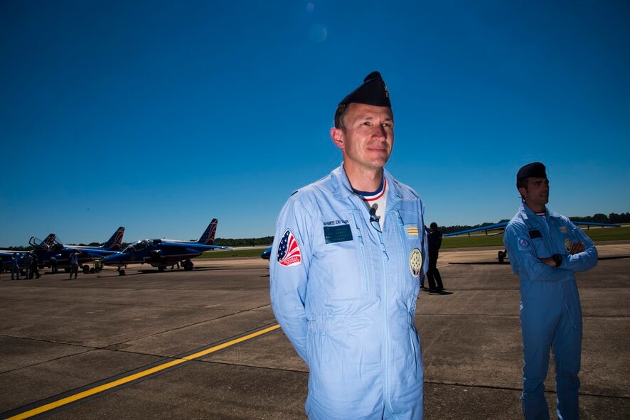 Capitaine Herve Aubert, Patrouille De France leader solo, takes a moment after the aerial demonstration to speak to media during the base Air Show, April 8, 2017.  This was the first time the Patrouille De France team performed in the United States. (U.S. Air Force photo/ Senior Airman Alexa Culbert)