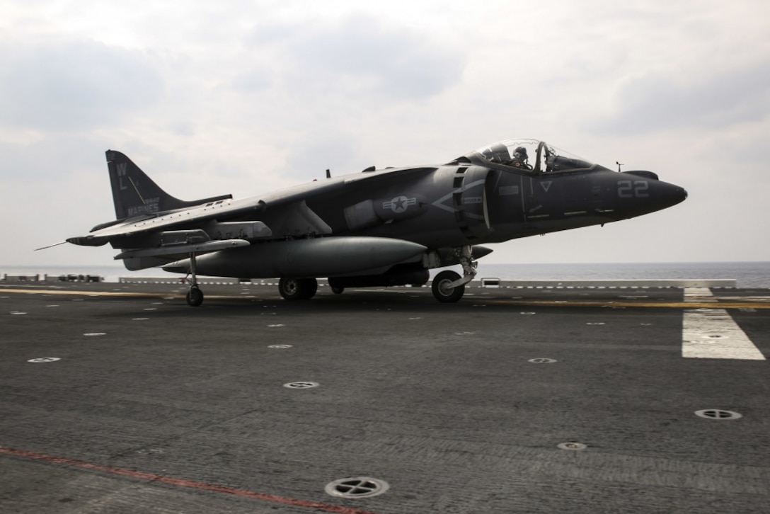 An AV-8B Harrier pilot with Marine Attack Squadron 311, 31st Marine Expeditionary Unit, signals to flight deck personnel during flight operations aboard the USS Bonhomme Richard (LHD 6) March 9, 2017. Marines and Sailors of the 31st MEU embarked aboard the USS Bonhomme Richard (LHD 6), part of the Bonhomme Richard Amphibious Readiness Group, as part of their annual spring patrol of the Indo-Asia-Pacific region. The 31st MEU, embarked on the amphibious ships of the Expeditionary Strike Group 7, has the capability to respond to any crisis or contingency at a moment’s notice. (U.S. Marine Corps photo by Sgt. Tiffany Edwards) 