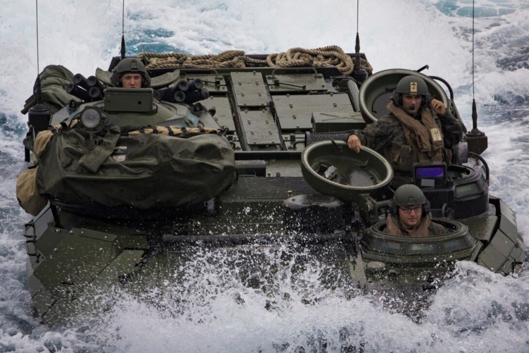 A Marine Corps AAV-P7/A1 assault amphibious vehicle with Battalion Landing Team, 2nd Battalion, 5th Marines, 31st Marine Expeditionary Unit, maneuvers off the coast of Okinawa, Japan, March 8, 2017. AAVs maneuvered into the well deck of USS Ashland (LSD 48) as part of the 31st MEU's regularly scheduled spring patrol aboard ships of the Bonhomme Richard Amphibious Ready Group. As the Marine Corps' only continuously forward-deployed unit, the 31st MEU air-ground-logistics team provides a flexible force, ready to perform a wide range of military operations, from limited combat to humanitarian assistance operations, throughout the Indo-Asia Pacific region. (U.S. Marine Corps photo by Cpl. Darien J. Bjorndal)