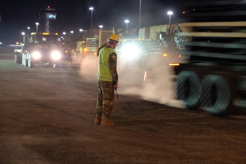 Left, the 7th Mission Support Command’s Sgt. Alexander Lapotsky a movement noncommissioned officer with the 793rd Movement Control Team, conducts port disembarkation operations for military vehicles, equipment download and convoy staging with Soldiers from the 497th Combat Sustainment Support Battalion, the 39th Transportation Battalion (MC), 16th Sustainment Brigade, 21st Theater Sustainment Command, 1st Inland Cargo Company, 18th Combat Sustainment Support Battalion, 405th Army Field Support Brigade, 32nd Composite Truck Company and the 839th Transportation Battalion from the Surface Deployment and Distribution Command as part of Operation Atlantic Resolve March 31, 2017.  