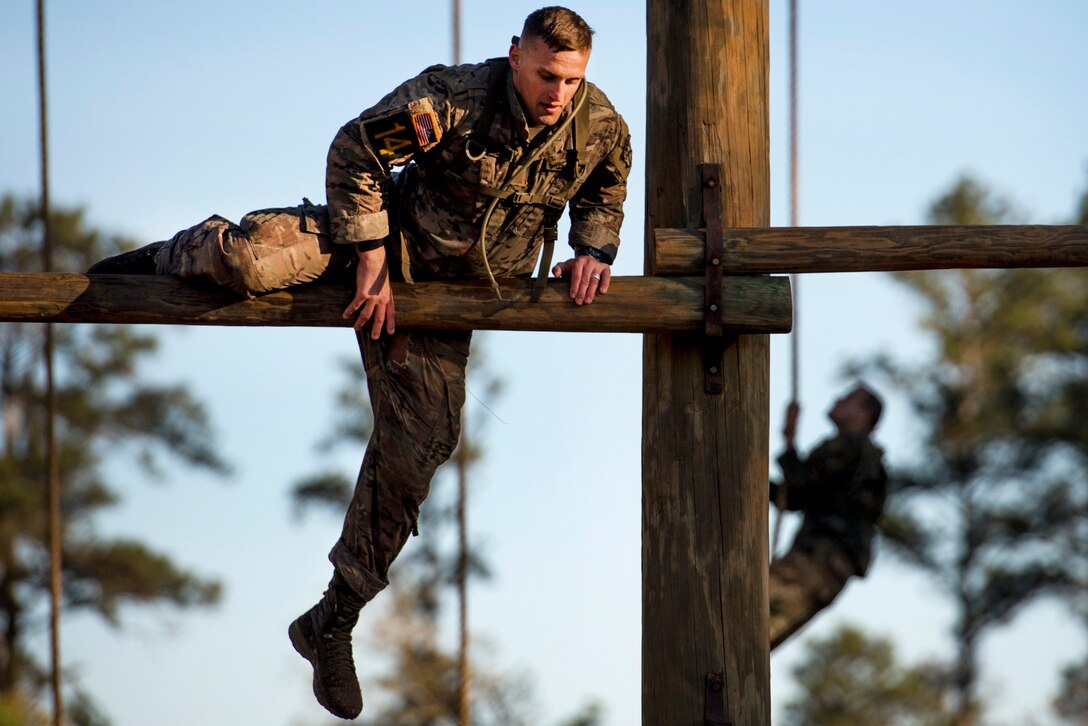 Army 1st Lt. Noah Currie moves over an obstacle during the Best Ranger Competition at Fort Benning, Ga., April 7, 2017. Currie is a Ranger assigned to the 10th Mountain Division. Air Force photo by Staff Sgt. Marianique Santos