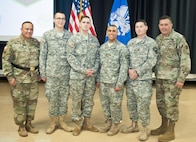 Soldier-competitors from the 99th Regional Support Command pose with Brig. Gen. Jose Burgos, Deputy Commanding General and Command Sgt. Maj. Arlindo Almeida, Command Sergeant Major of the 99th Regional Support Command pose for a picture with the winners and runners up from the command’s 2017 Best Warrior Competition at Fort Devens, Massachusetts on 6 April 2017. Of the 11 competitors from the command, these Soldiers stood out amongst their peers in the Junior Enlisted and Noncommissioned Officer categories the winners will move on to the U.S. Army Reserve Command’s 2017 Best Warrior Competition slated for June.