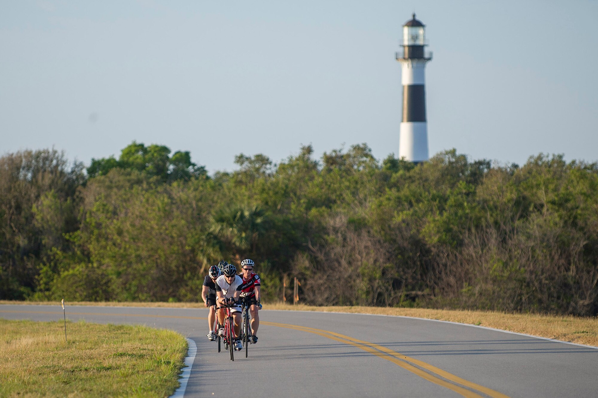 Airmen participate in a Cape Canaveral Air Force Station bike tour, emphasizing that fitness and a healthy lifestyle are essential to being a well-rounded Airman March 30, 2017. (U.S. Air Force photo/Phil Sunkel) 
