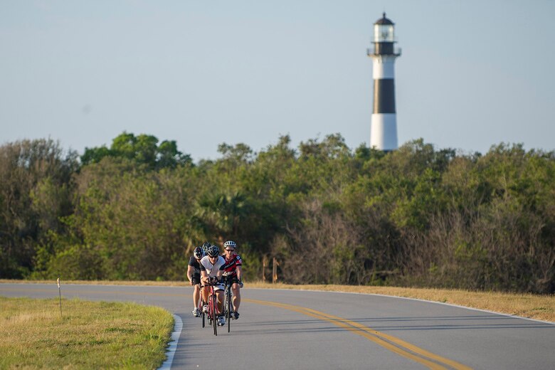 Airmen participate in a Cape Canaveral Air Force Station bike tour, emphasizing that fitness and a healthy lifestyle are essential to being a well-rounded Airman March 30, 2017. (U.S. Air Force photo/Phil Sunkel) 