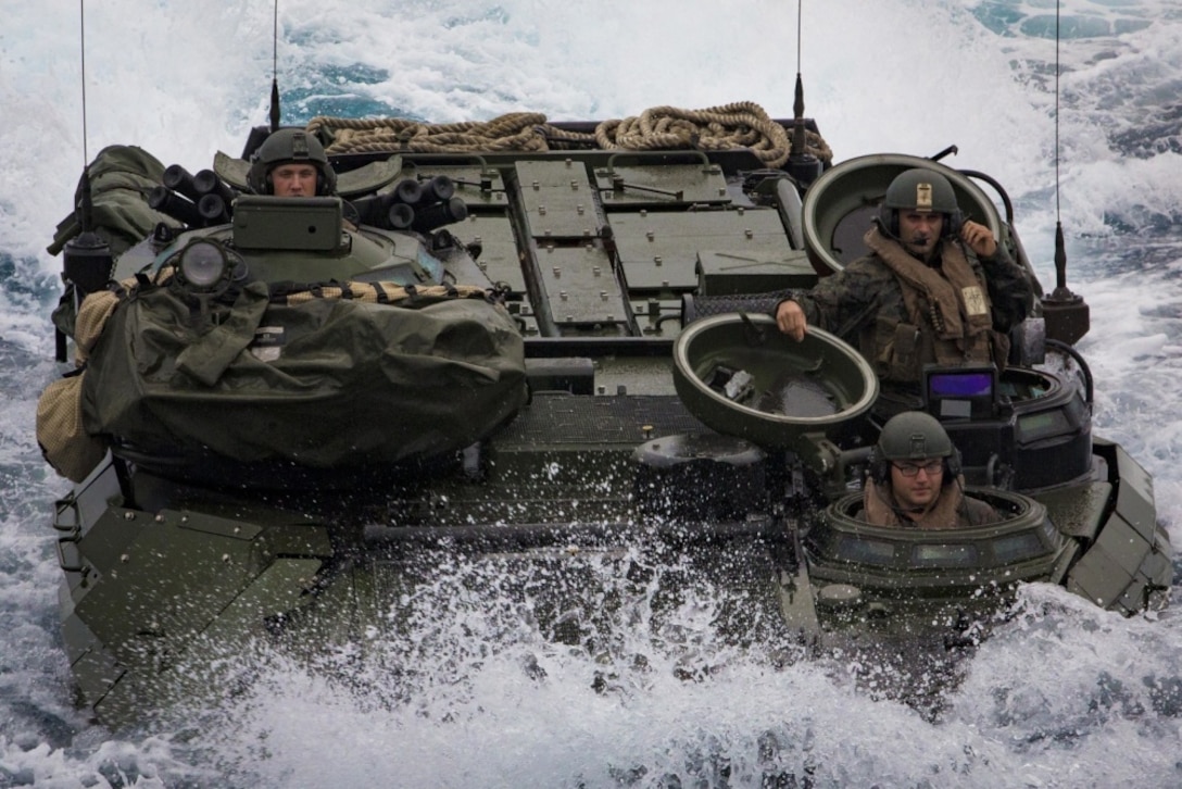 A Marine Corps AAV-P7/A1 assault amphibious vehicle with Battalion Landing Team, 2nd Battalion, 5th Marines, 31st Marine Expeditionary Unit, maneuvers off the coast of Okinawa, Japan, March 8, 2017. AAVs maneuvered into the well deck of USS Ashland as part of the 31st MEU's regularly scheduled spring patrol aboard ships of the Bonhomme Richard Amphibious Ready Group. 