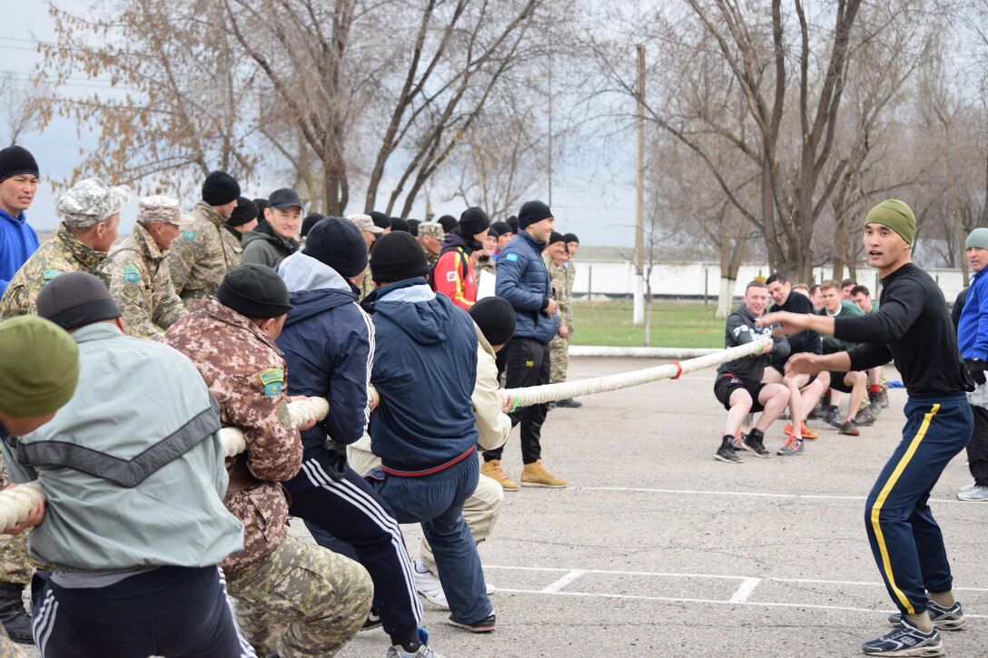Kazakhstani soldiers face-off against U.K. Soldiers during a friendly tug-o-war competition after a day of military-to-military engagements at Steppe Eagle Koktem Apr. 4, 2017, at Illisky Training Center, Kazakhstan.