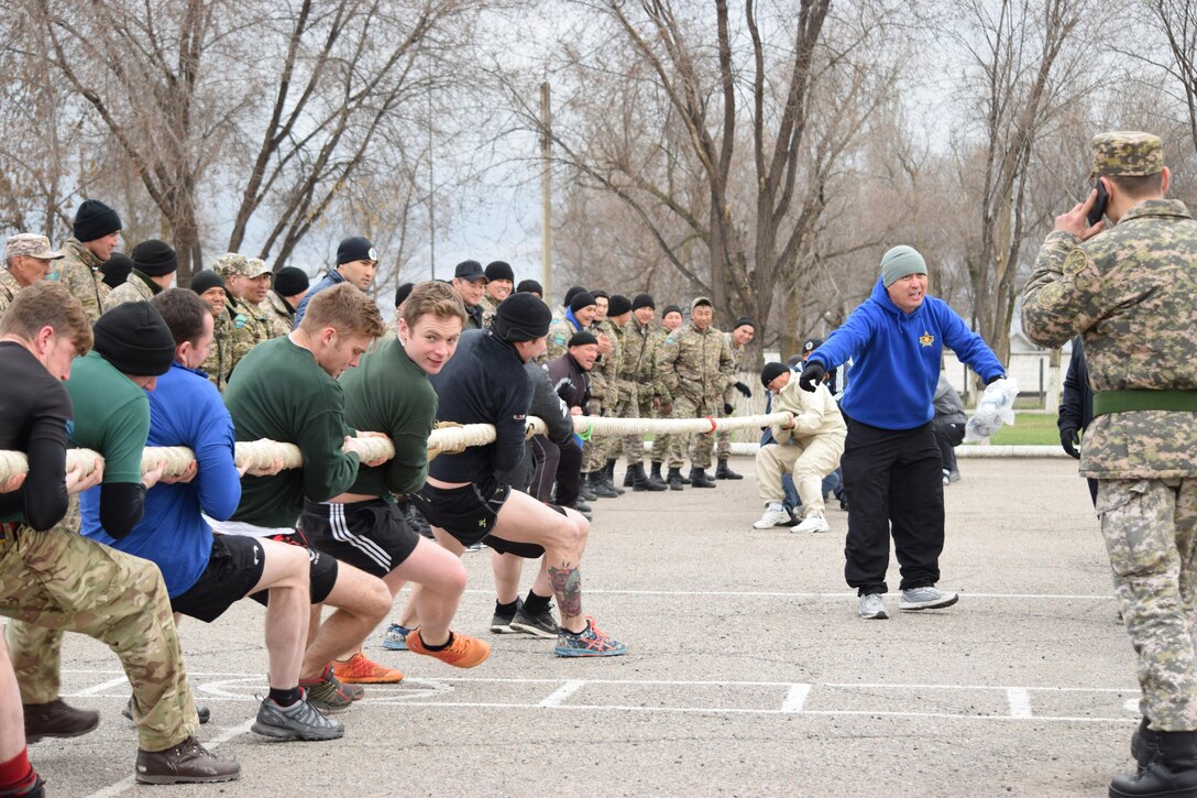U.K. soldiers from 1st Battalion, The Rifles, 160 Brigade, go up against Kazakhstani soldiers from the Kazakhstan Peacekeeping Battalion during a friendly tug-o-war competition Apr. 4, 2017, during Steppe Eagle Koktem at Illisky Training Center, Kazakhstan.