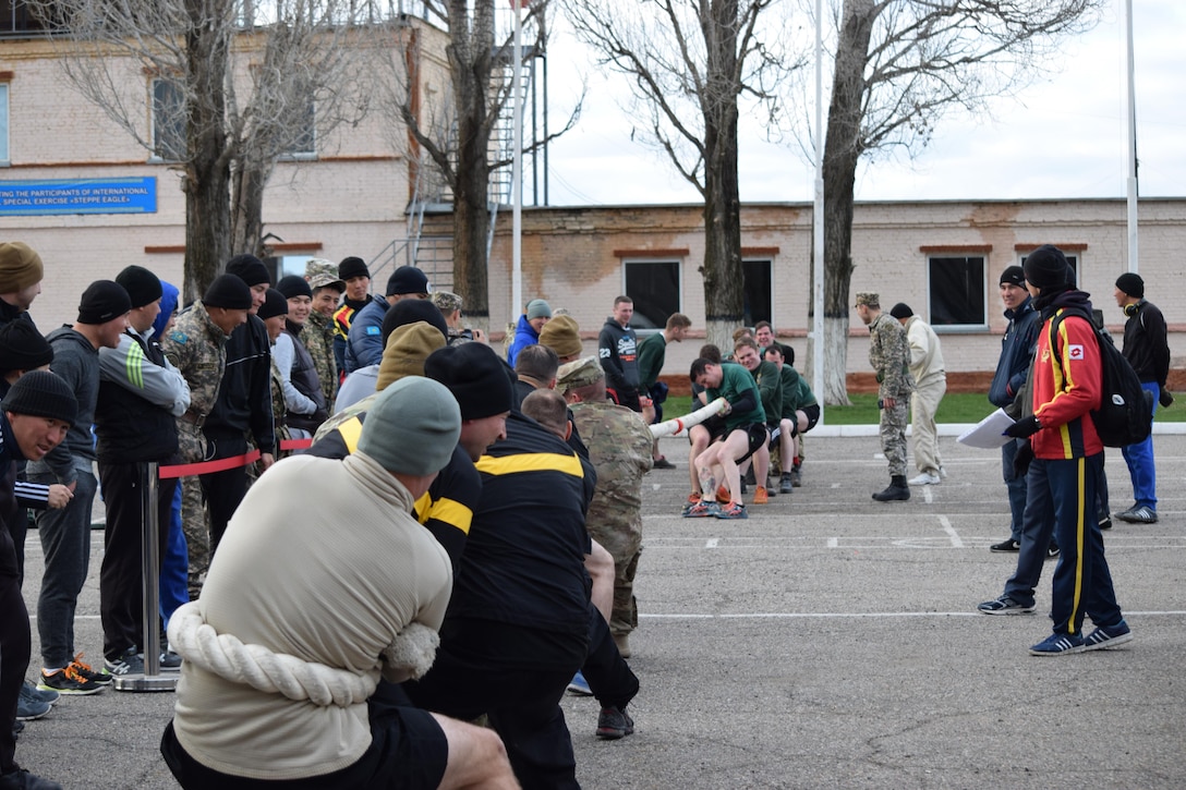 U.S. Army Soldiers participate in a tug-o-war competition with U.K. soldiers during a friendly sports competition Apr. 4, 2017, after a day of military-to-military engagements for Steppe Eagle Koktem at Illisky Training Center, Kazakhstan.