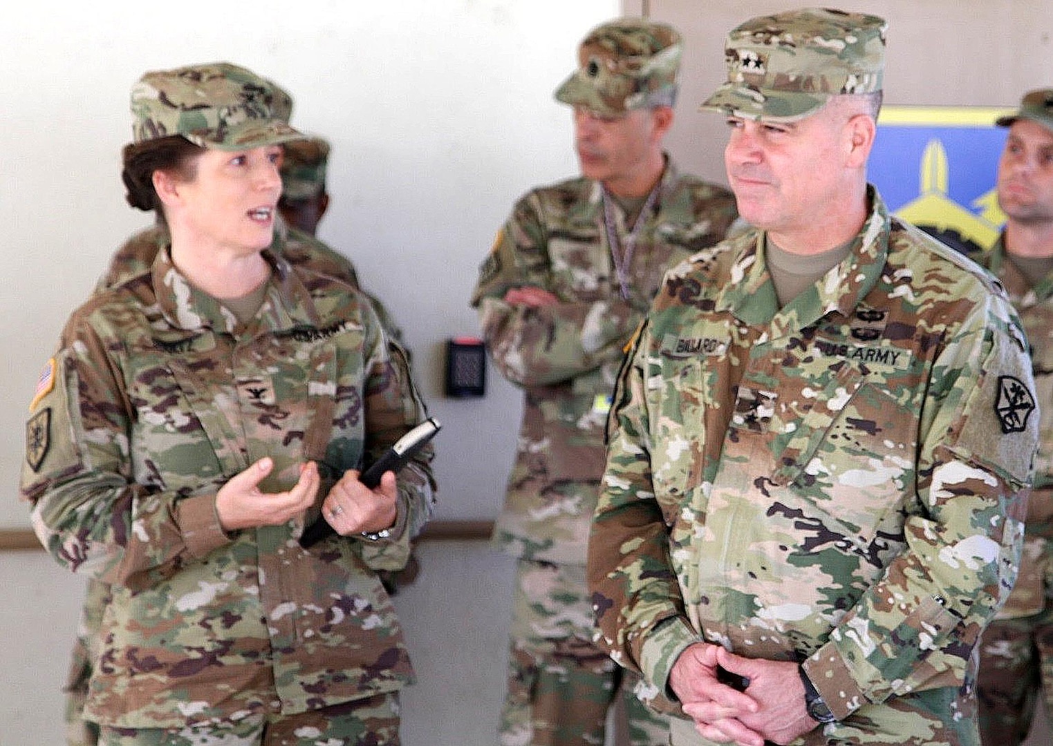 Army Lt. Col Dustin Shultz (left), commander, 505th Military Intelligence Brigade, speaks with Maj. General Christopher Ballard, commander, U.S. Army Intelligence and Security Command, during his visit to Joint Base San Antonio-Camp Bullis March 31.