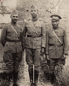 Officers of the 2nd Battalion, 372nd Infantry in France: 2nd Lt. Tom Walker (from left), 1st Lt. Ben Rudd and 2nd Lt. William Nichols. The 372nd was a segregated unit that earned the French Croix de Guerre with Palm during the Meuse-Argonne campaign for its heroic actions in battle. April 6, 2017, commemorates the 100th anniversary of the U.S. entry into World War I. 