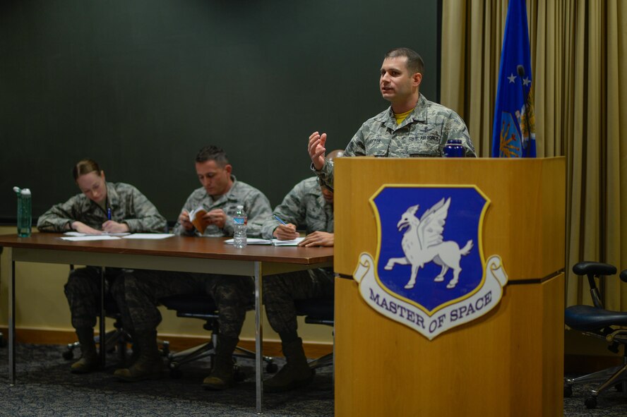 Master Sgt. Matt Lofton, 2nd Space Operations Squadron, argues for the Top III Council during the Schriever Debate at Schriever Air Force Base, Colorado, Feb. 24, 2017. The council organizes the debates, in which participant’s debate for or against pertinent topics in today’s Air Force, such as the pros and cons of the blended retirement system. (U.S. Air Force photo/Christopher DeWitt)