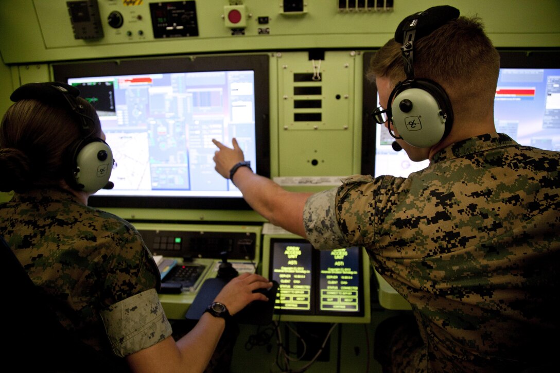 U.S. Marines assigned to the Unmanned Aerial System Operators Course, Marine Detachment Fort Huachuca, use a Universal Ground Data Terminal Control System simulation at Fort Huachuca, Ariz., March 17, 2017. The mission of Marine Detachment Fort Huachuca is to train intelligence and UAS Marines entry, intermediate, and advanced level skills for the Fleet Marine Force. (U.S. Marine Corps photo by Lance Cpl. Jose Villalobosrocha)