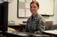 Tech. Sgt. Brooke Howells, 315th Airlift Wing historian, pauses from her report preparations April 8, 2017 at Joint Base Charleston, S.C. (U.S. Air Force photo by Senior Airman Jonathan Lane)